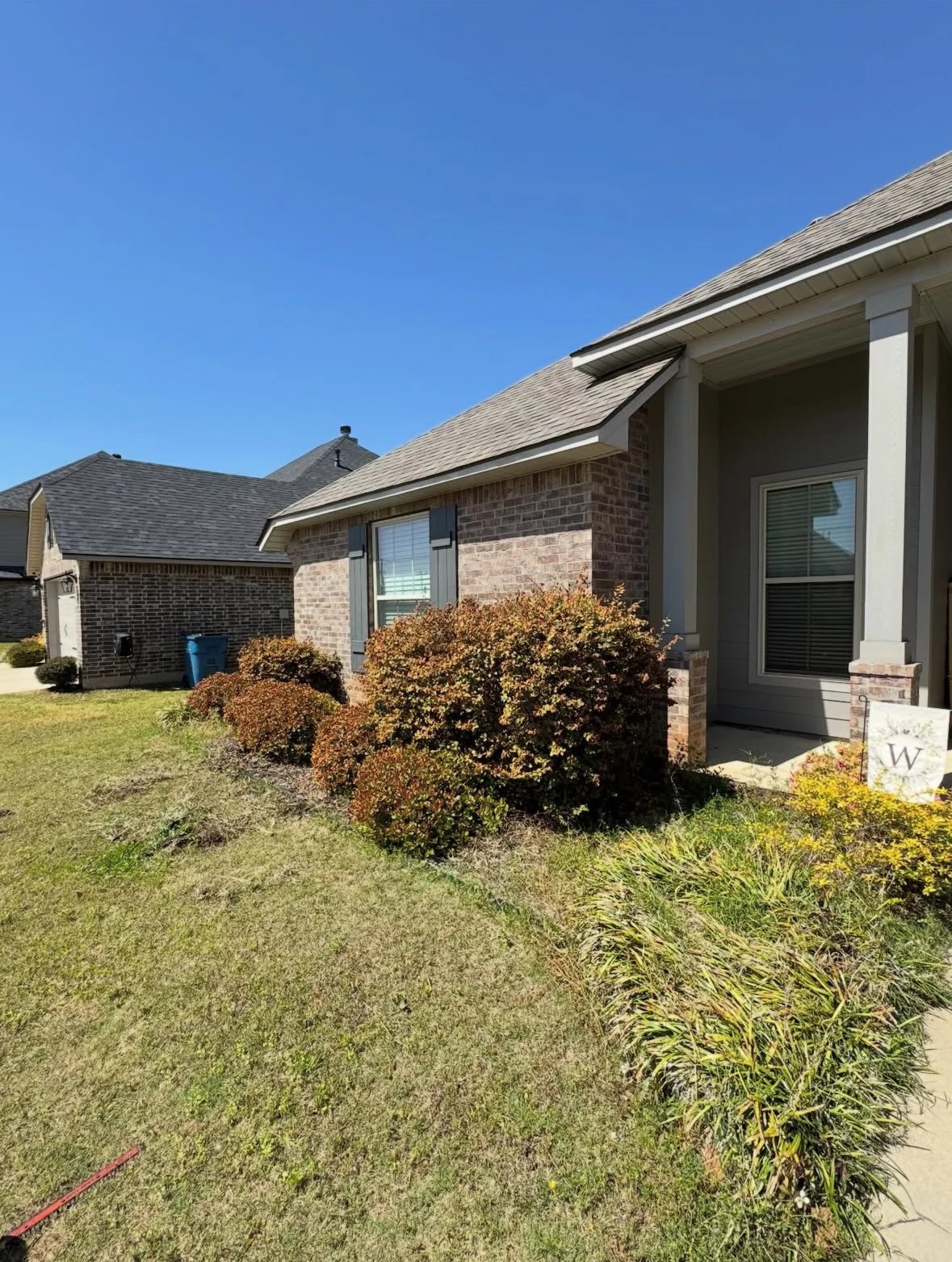 Front yard cleanup and fresh mulch beds before