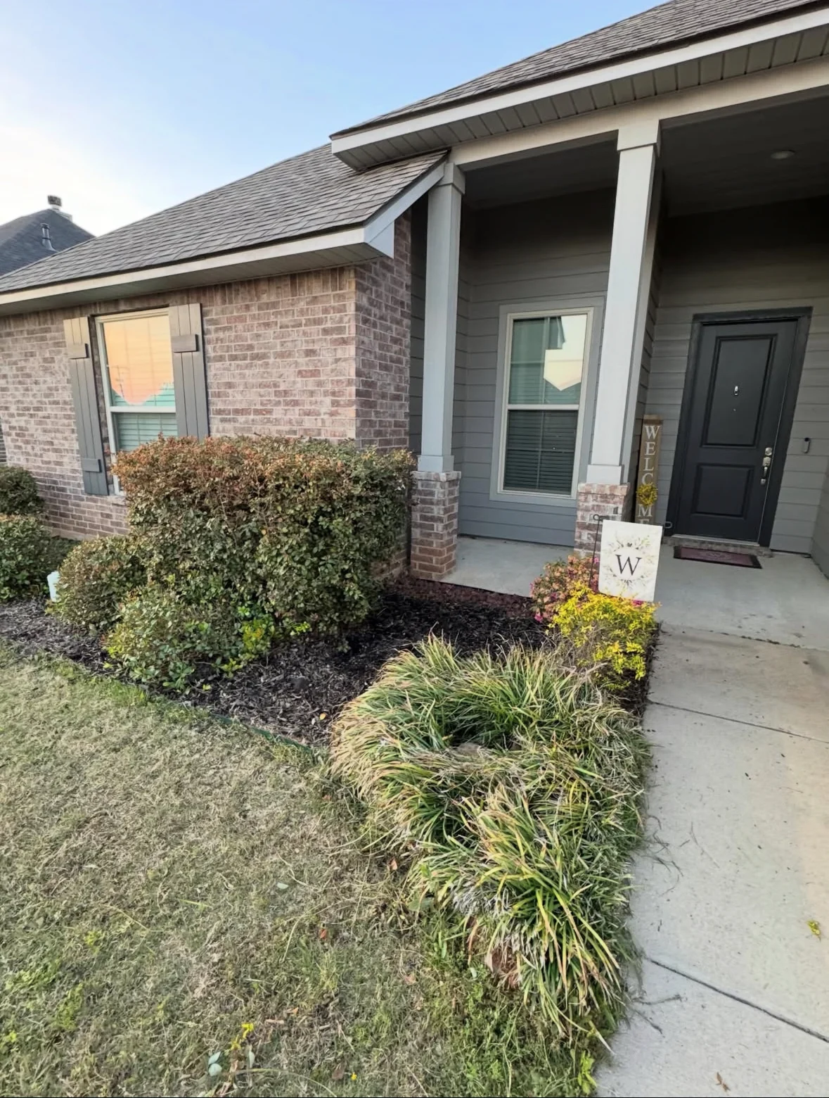 Front yard cleanup and fresh mulch beds after